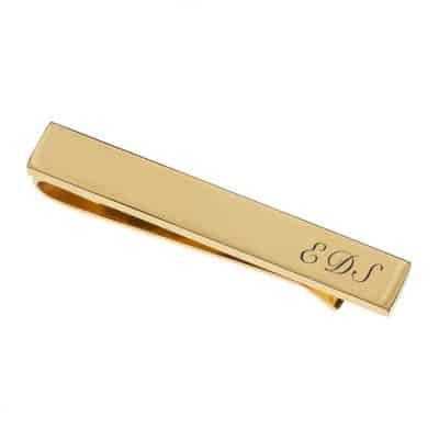 50 year anniversary gift idea for him: personalized tie bar in gold color