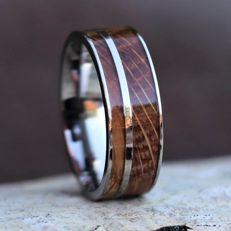 unique gift for fiance who is a whiskey lover: whiskey barrel ring