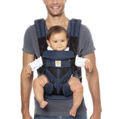 first time dad gifts: dad using baby carrier for his baby