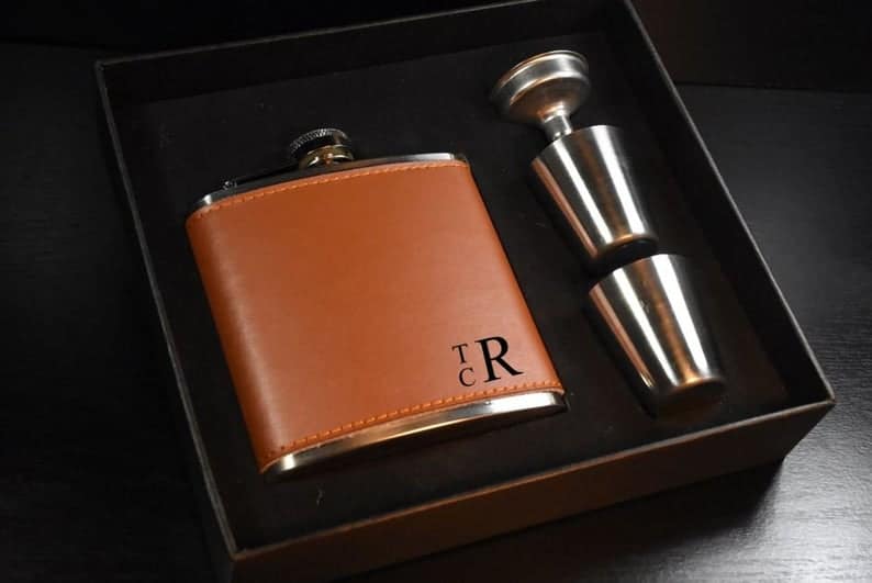 father of the bride gifts: monogrammed leather flask