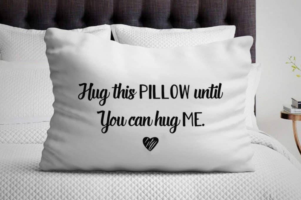 'hug this pillow until you can hug me" pillowcase