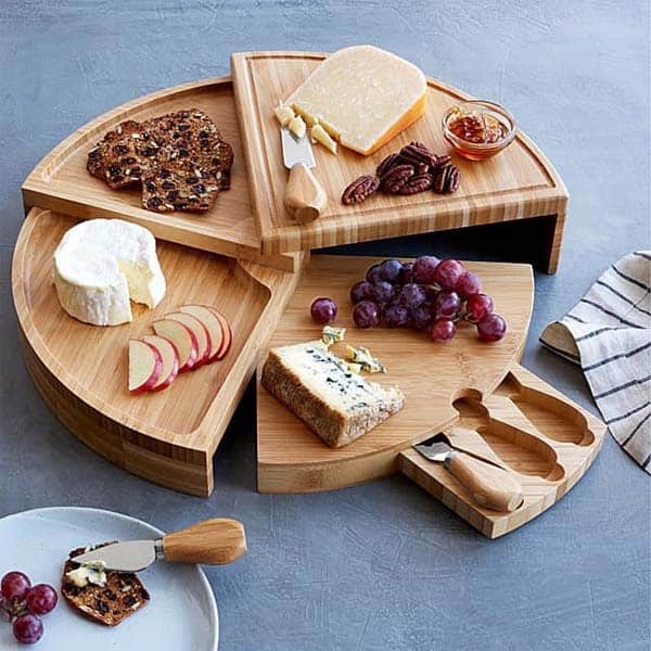 best housewarming gifts for guys: compact cheese board with knives