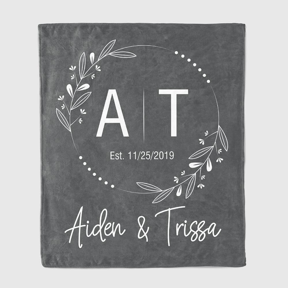 throw blanket with the couple initials