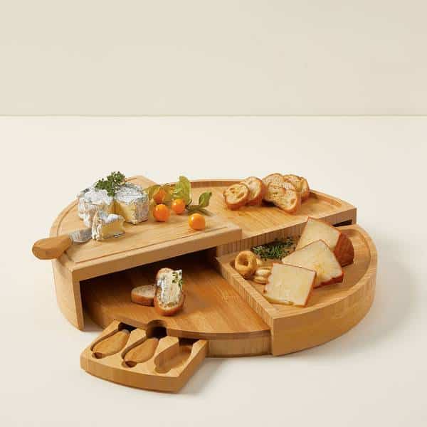 practical wedding gift for sister: Compact Swivel Cheese Board with Knives