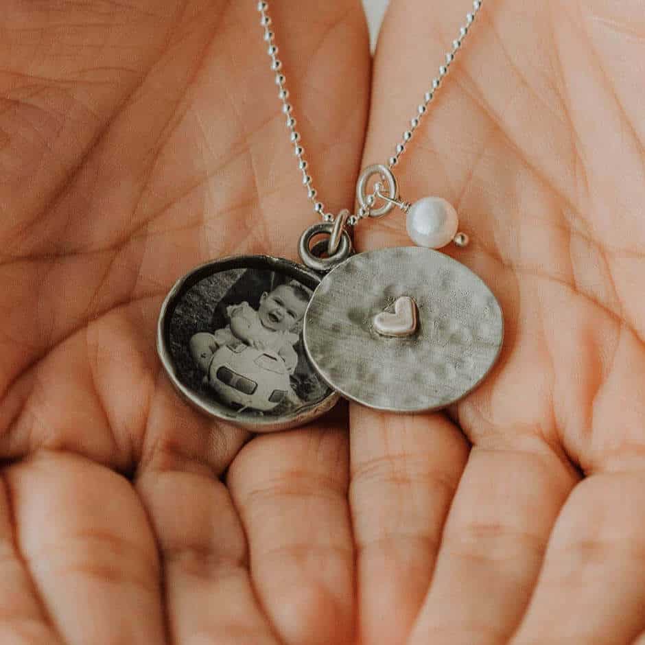 a vintage locket necklace gift with a child picture inside