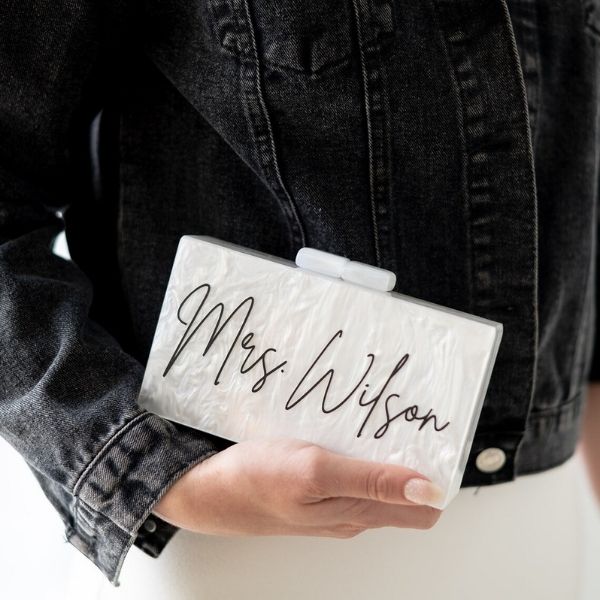 bridal shower gifts for a sister: Acrylic Mrs. Clutch