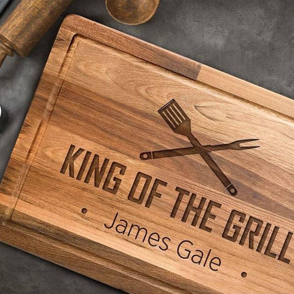 practical father's day gift for son-in-law: King of the Grill Cutting Board